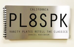 Metal bookcover for a book written with license plates